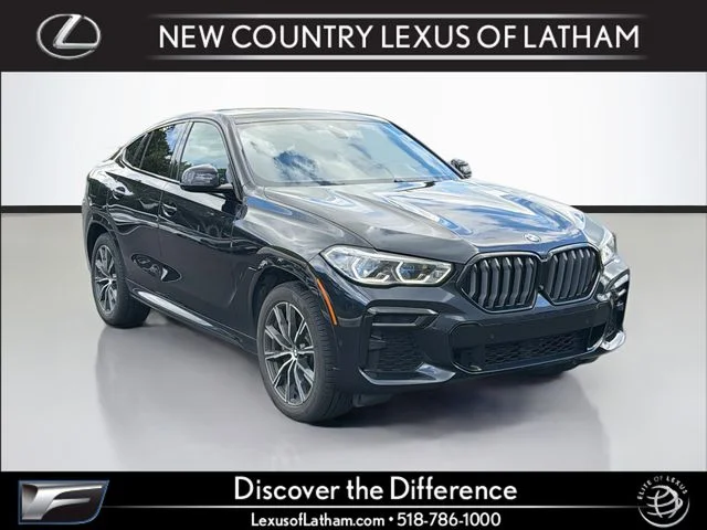 Used 2023 Black BMW xDrive40i image 1