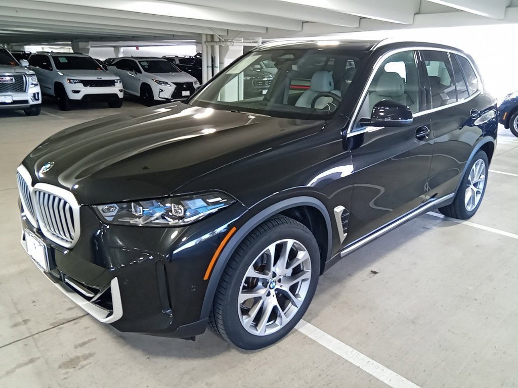 Used 2025 Black Sapphire Metallic BMW xDrive40i image 1