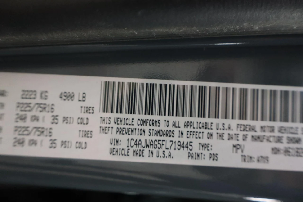 Used 2015 Hydro Blue Pearl Coat Jeep Sport image 13