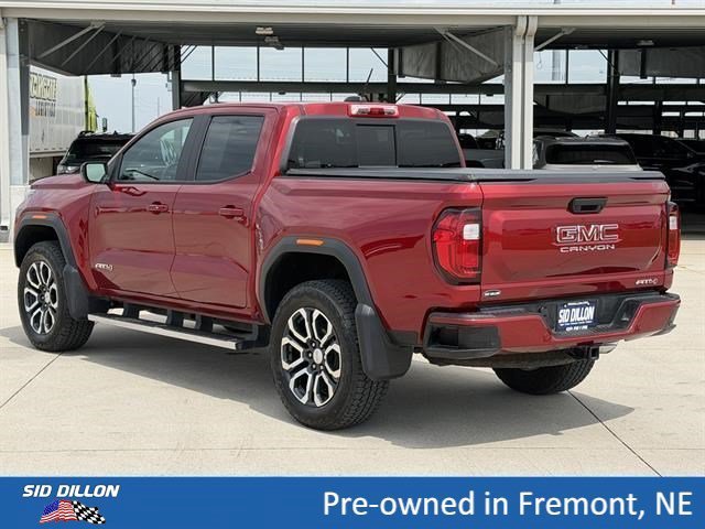 Used 2024 Volcanic Red Tintcoat GMC 4WD AT4 image 7