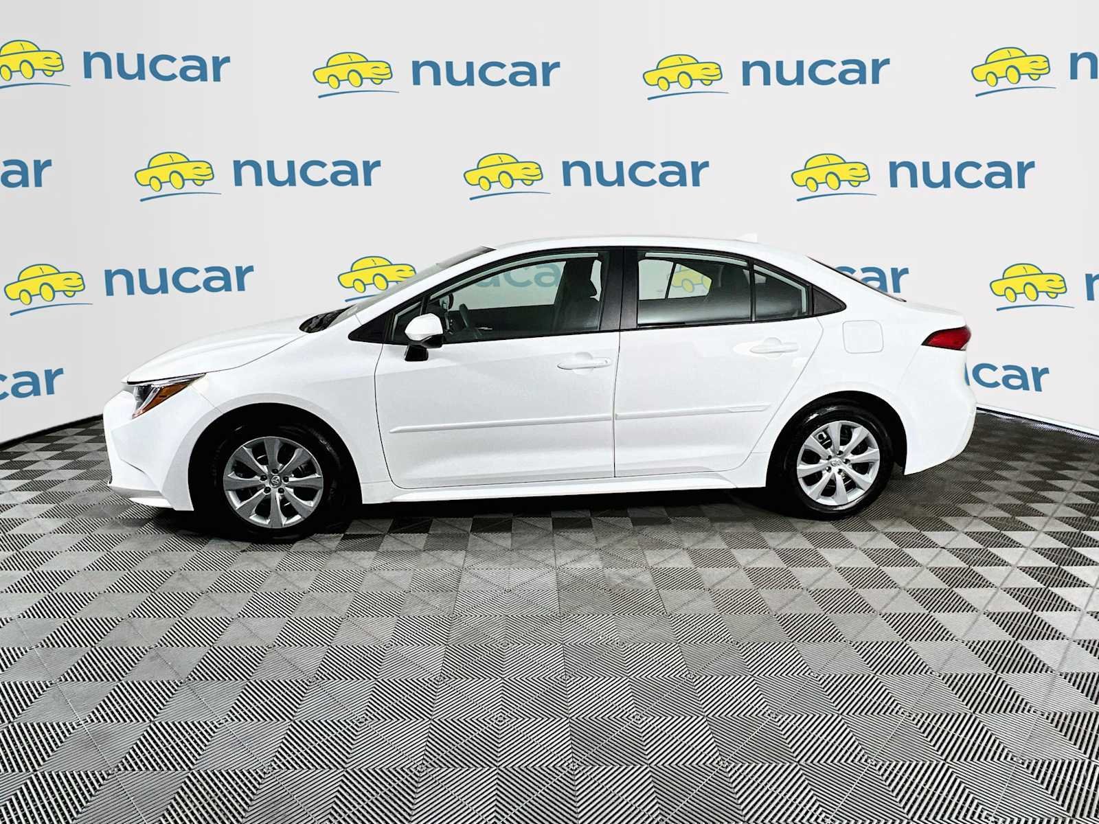 Used 2021 Super White Toyota LE image 4