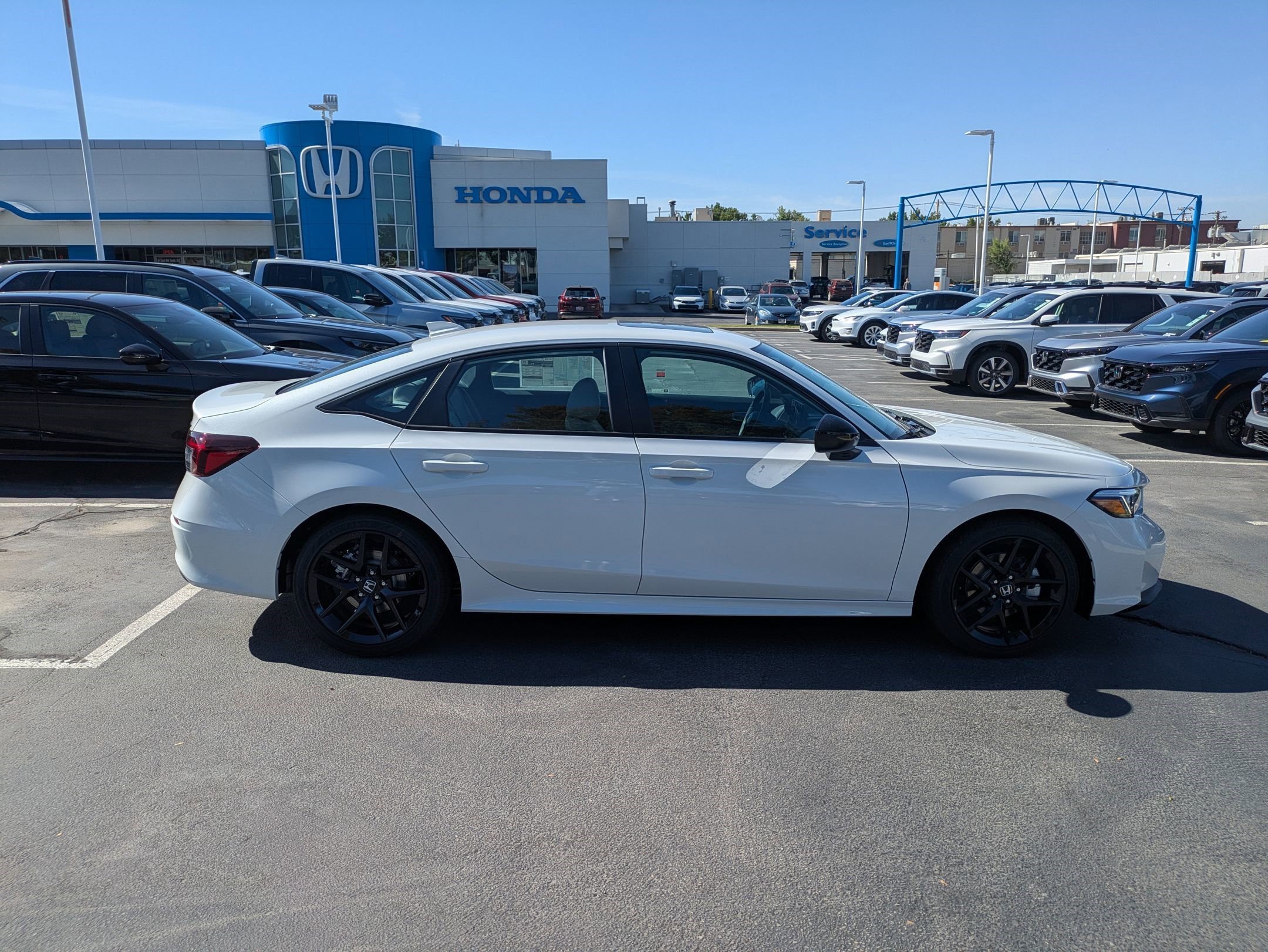New 2026 Platinum White Pearl Honda Sport image 2