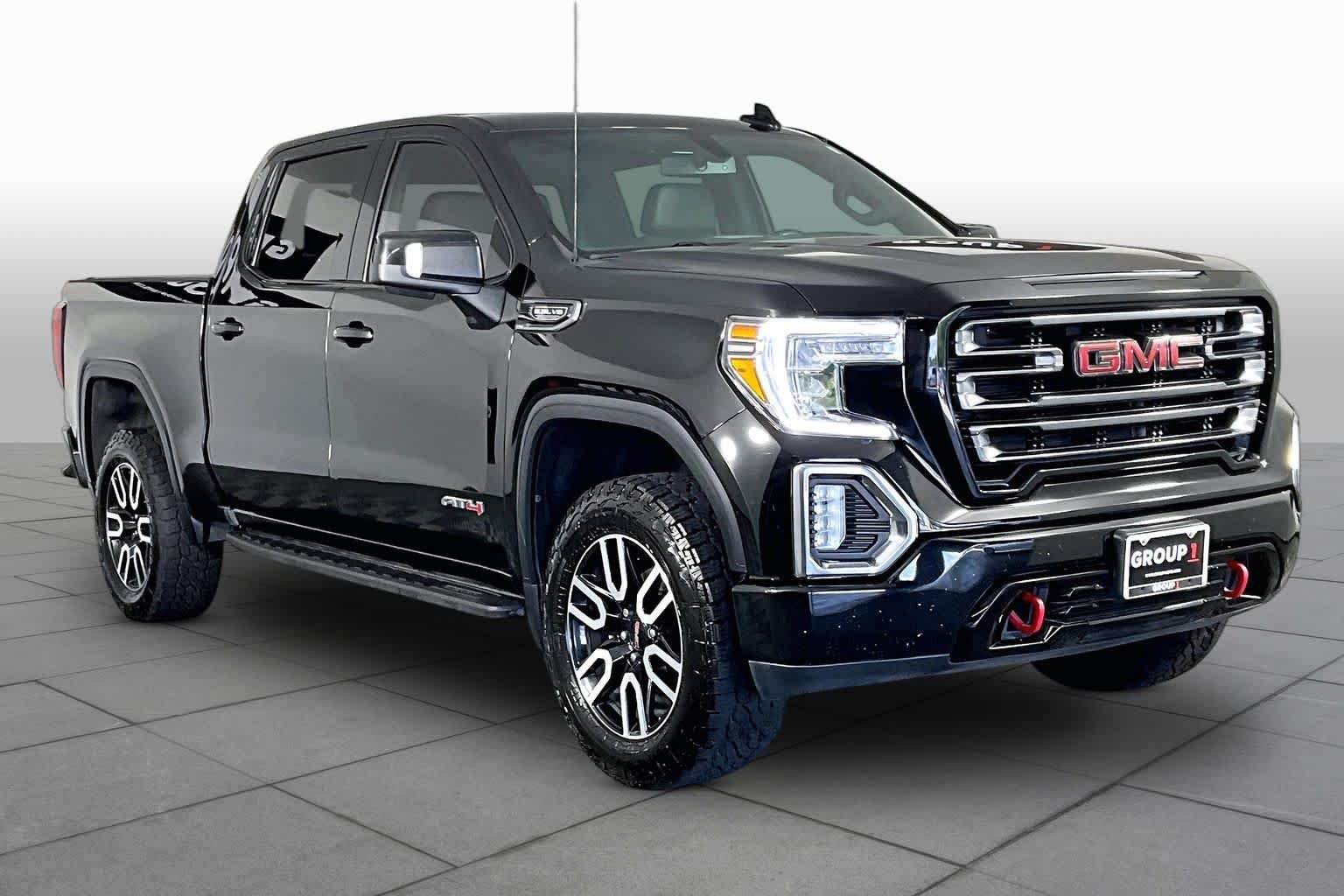 Used 2021 EBONY TWILIGHT METALLIC GMC AT4 image 3