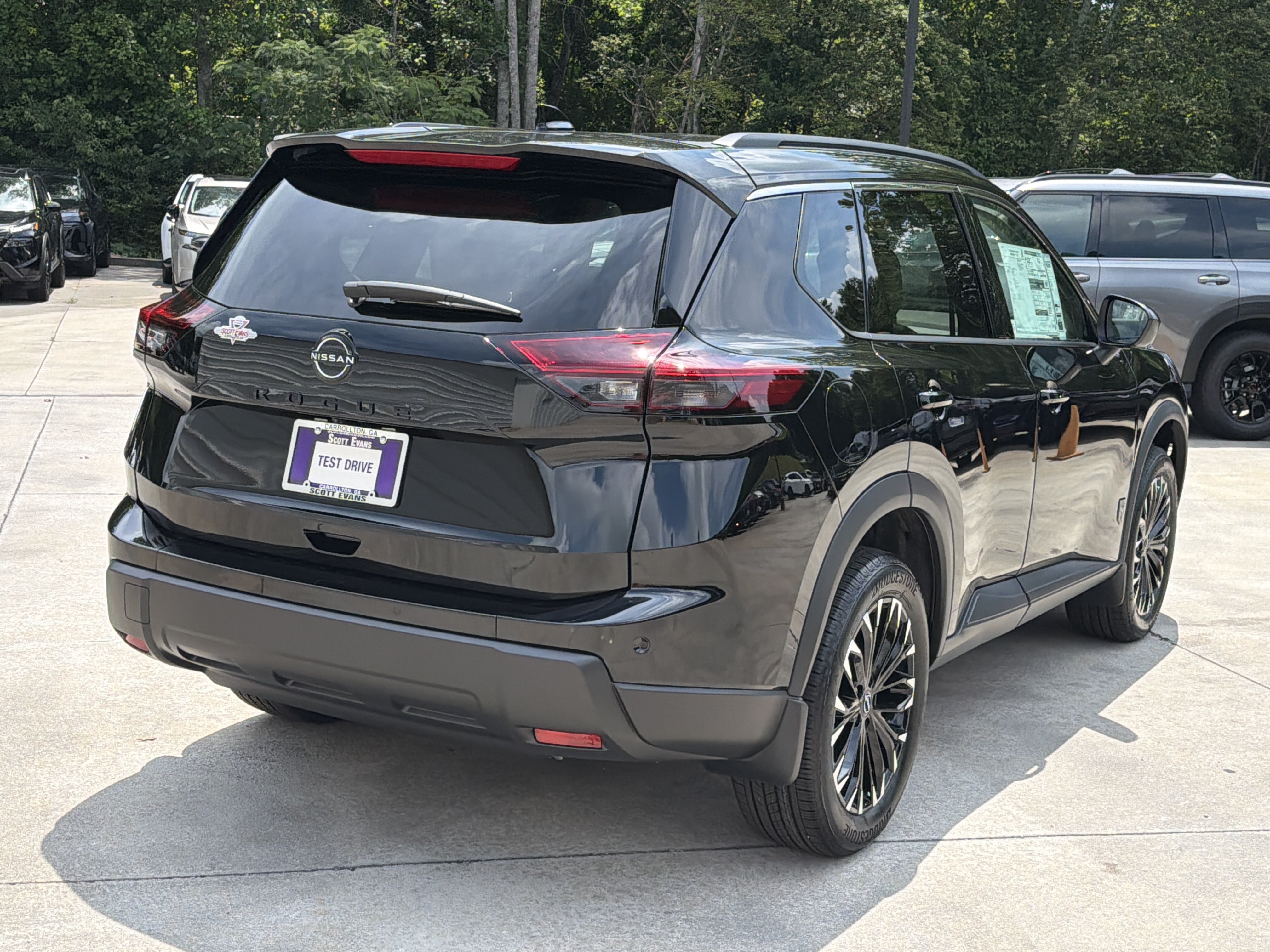New 2026 Super Black Nissan Dark Armor image 8