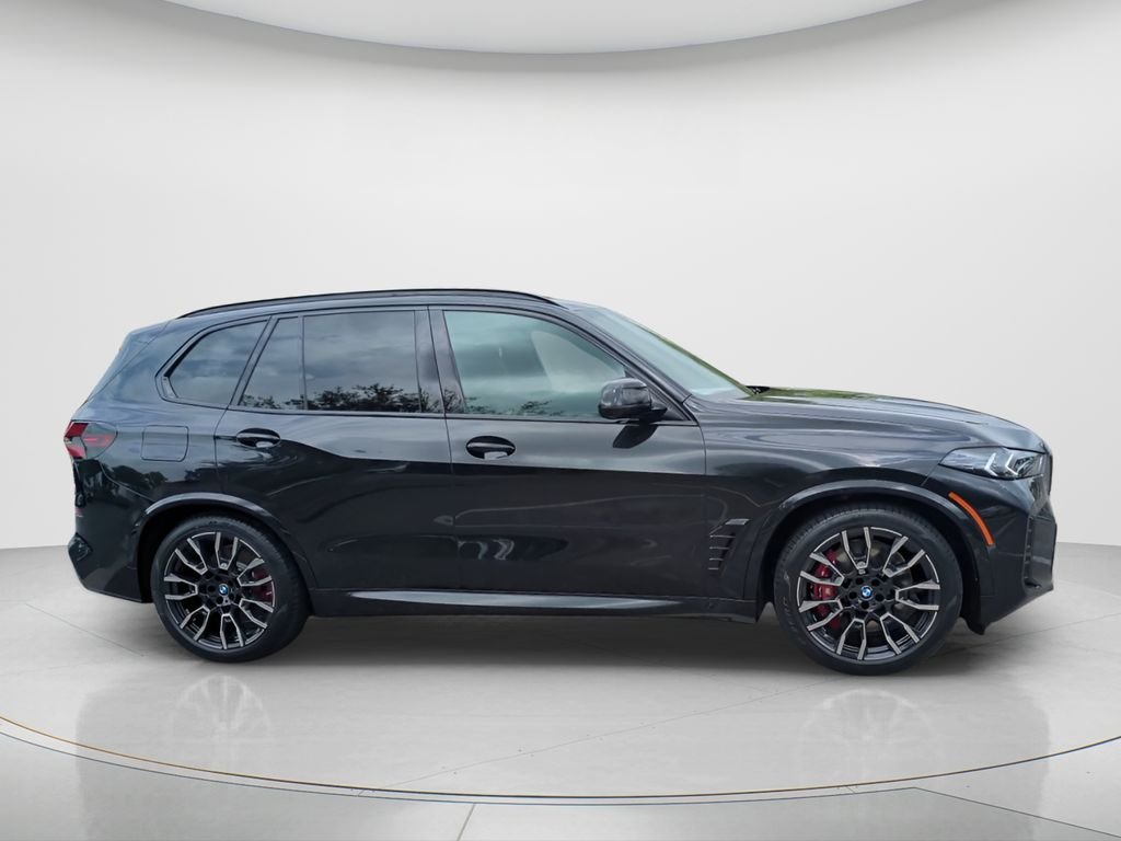 New 2026 Black Sapphire Metallic BMW xDrive50e image 6