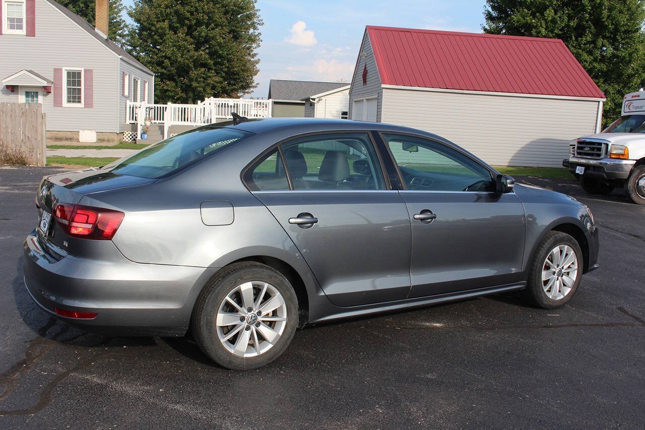 Used 2016 Volkswagen Jetta SE with VIN 3VWD67AJ0GM335229 for sale in Durant, IA
