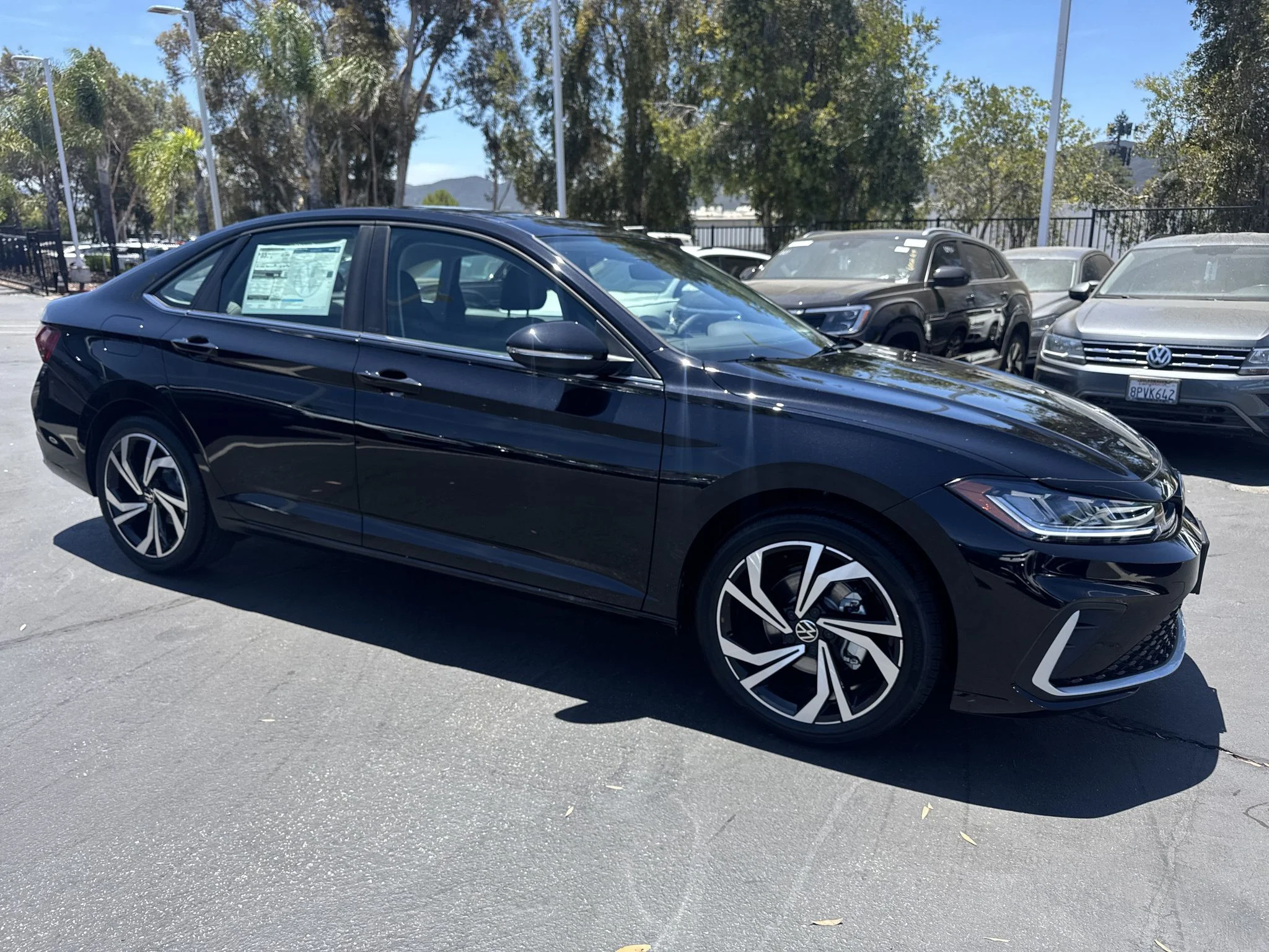 New 2026 Deep Black Pearl Volkswagen SEL image 1