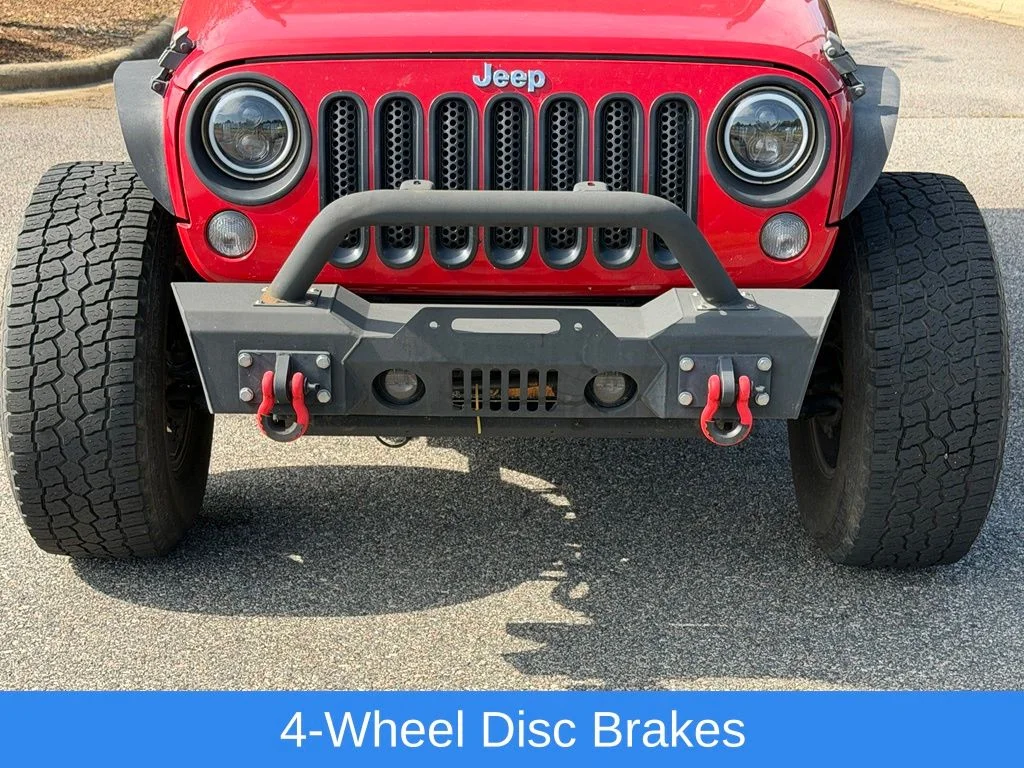 Used 2014 Red Jeep Unlimited Sport image 13