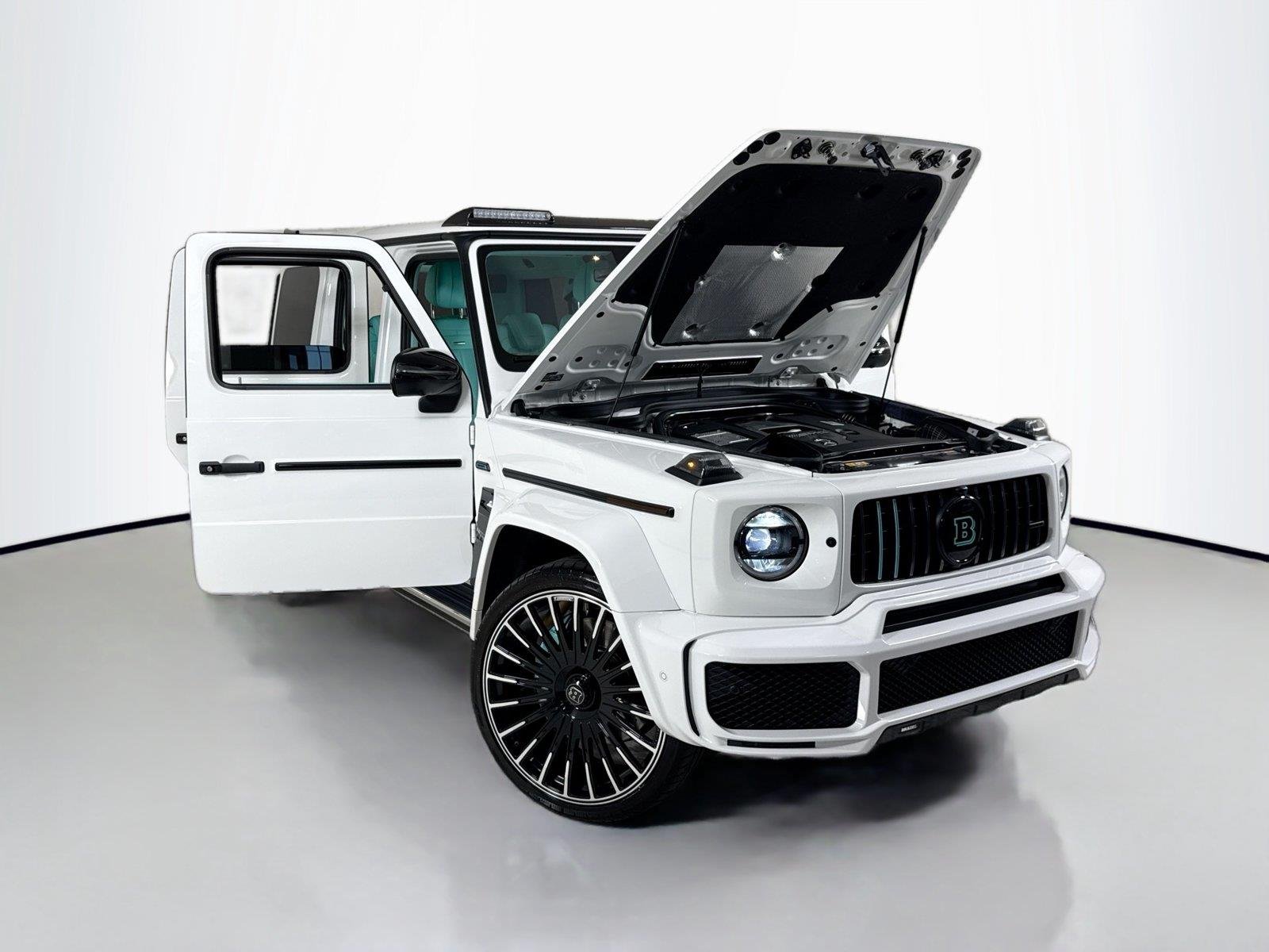 Used 2024 Polar White Mercedes-Benz AMG® G 63  Brabus Custom Widebody / Custom Tiffany Interior image 48