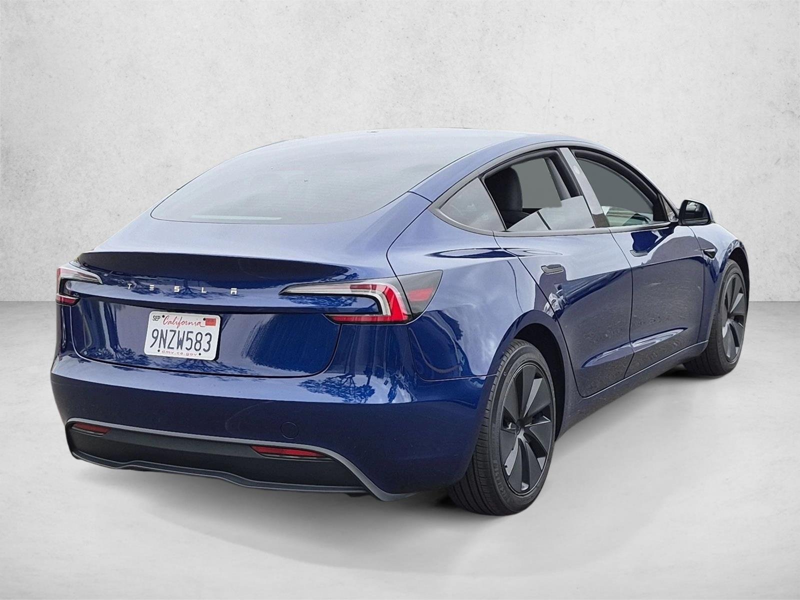Used 2024 Deep Blue Metallic Tesla  image 5