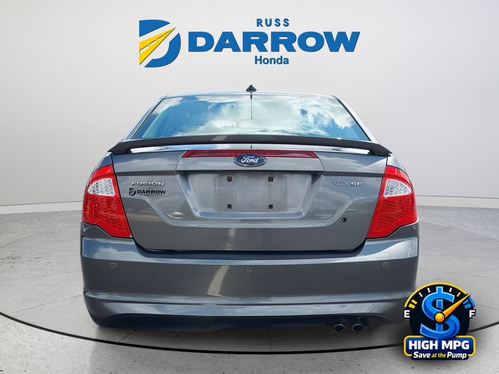 Used 2010 Gray Ford SE image 4