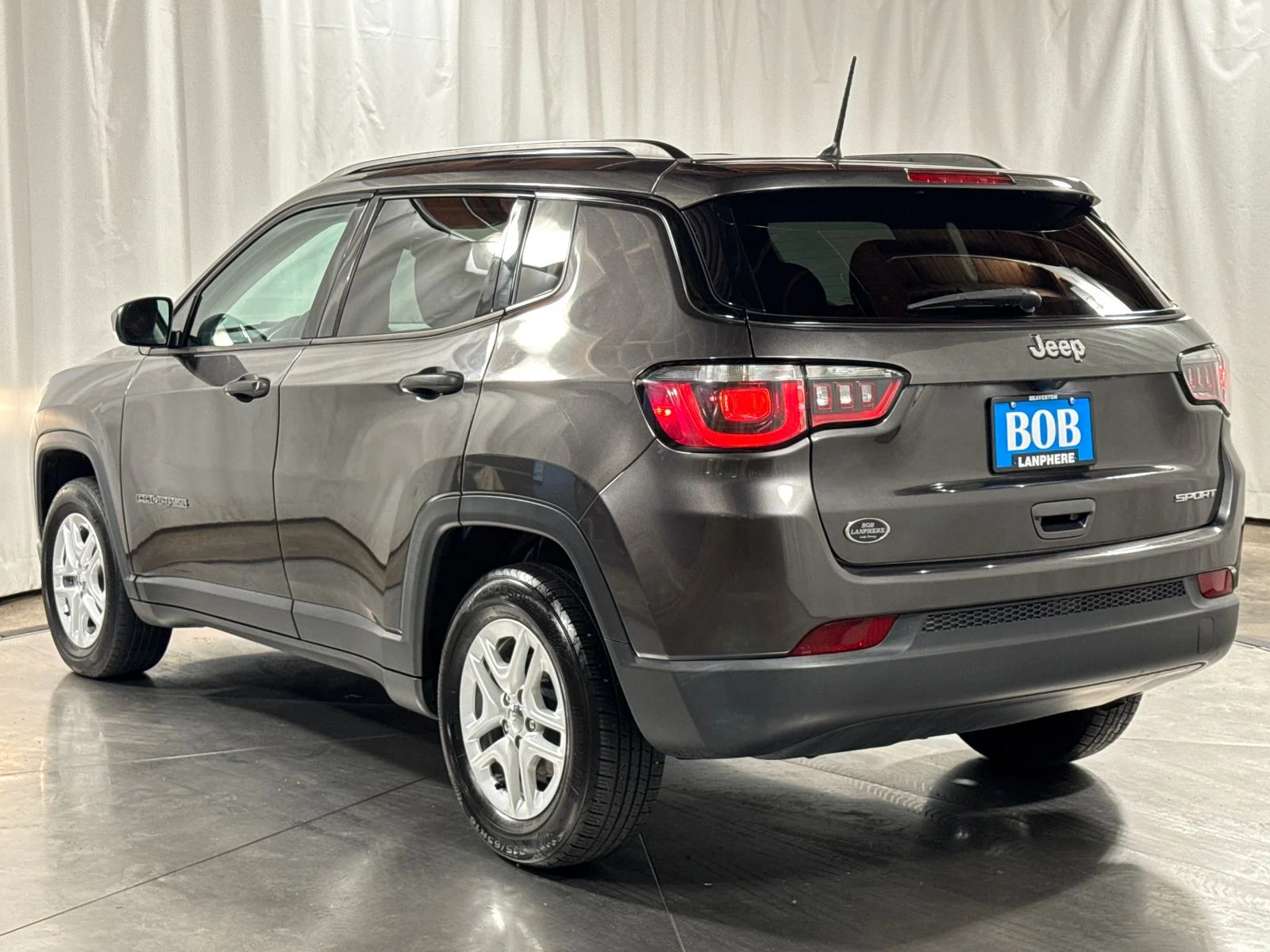 Used 2018 Granite Crystal Metallic Clearcoat Jeep Sport image 9