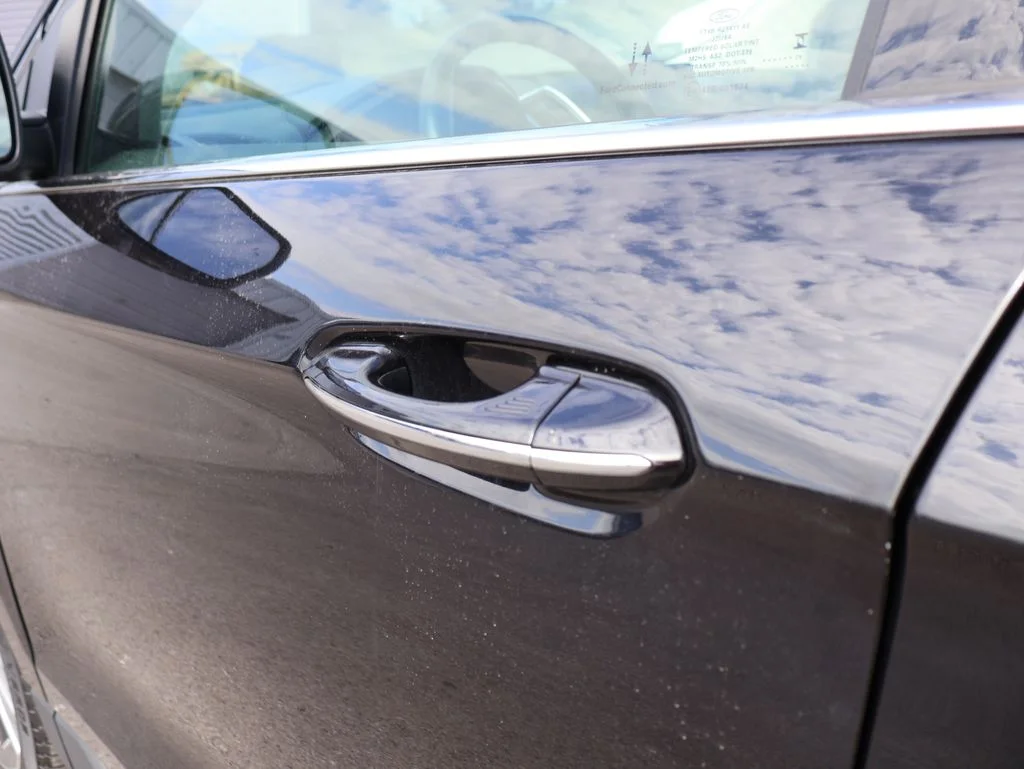 Used 2024 Black Metallic Ford Titanium image 19