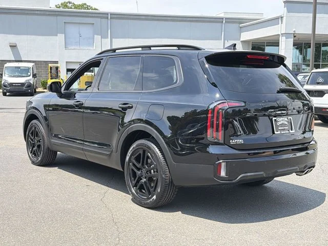 Used 2025 Black Kia EX X-Line image 11