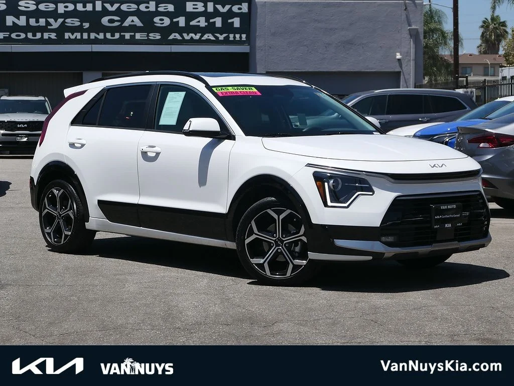 Used 2024 White Kia EX Touring image 1