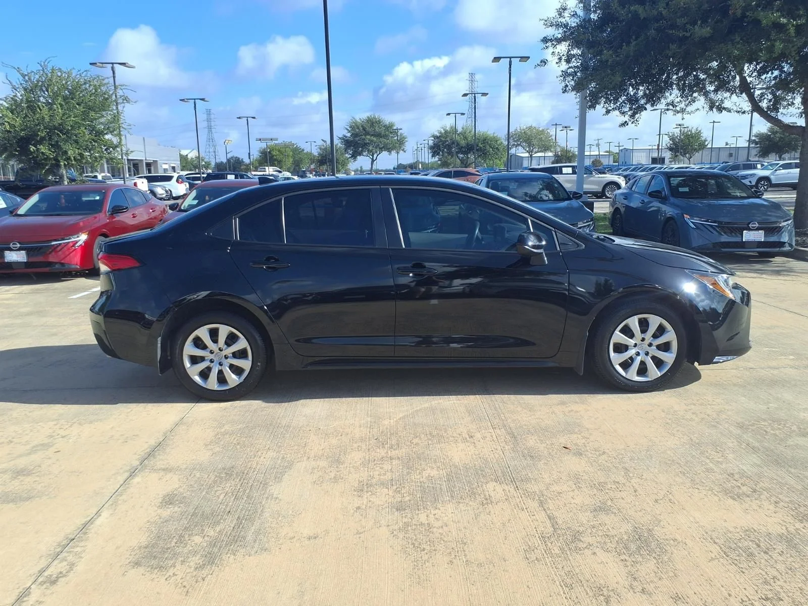 Used 2026 Black Toyota LE image 9