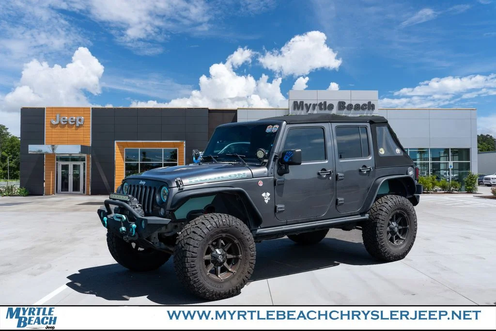 Used 2017 Granite Crystal Metallic Clearcoat Jeep Unlimited Rubicon image 1