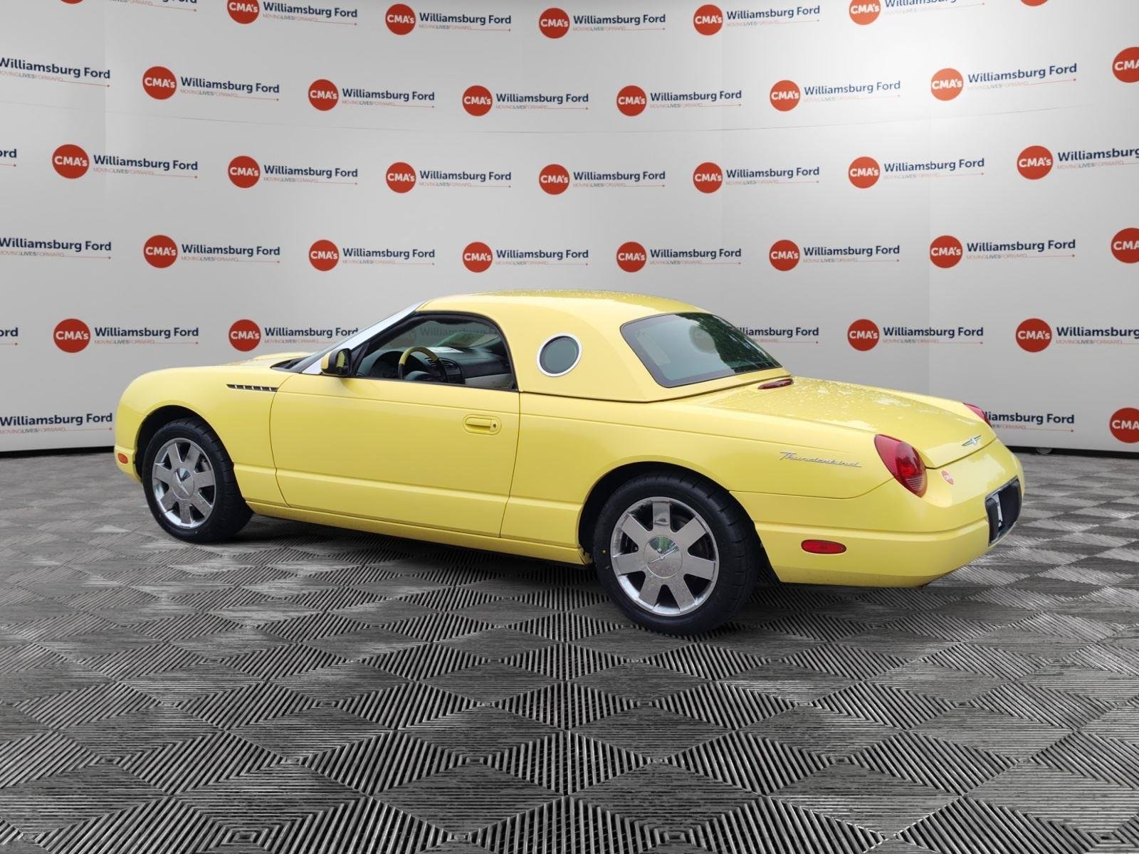 Used 2002 Inspiration Yellow Ford Deluxe image 3