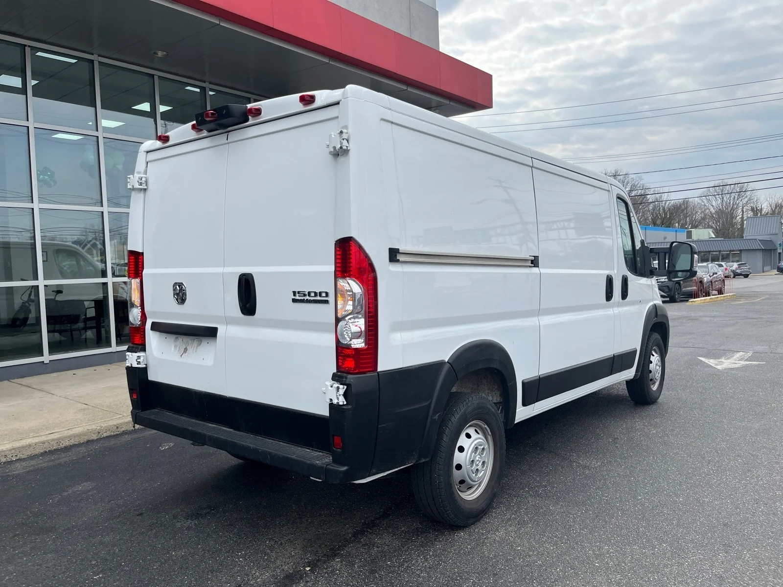 Used 2023 Bright White Clearcoat Ram Low Roof WB image 6
