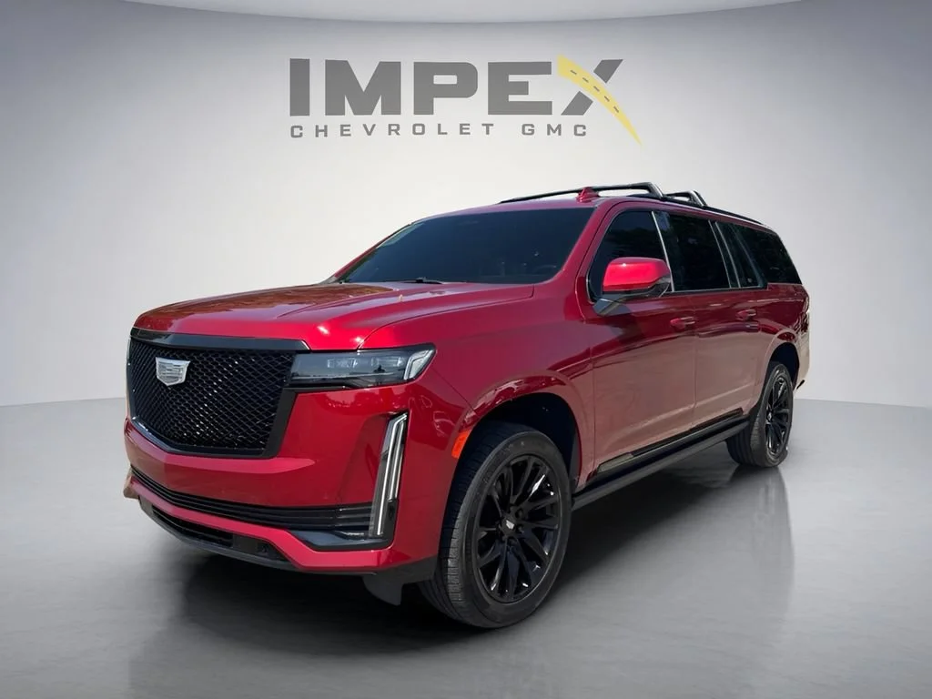 Used 2023 Radiant Red Tintcoat Cadillac Sport image 1