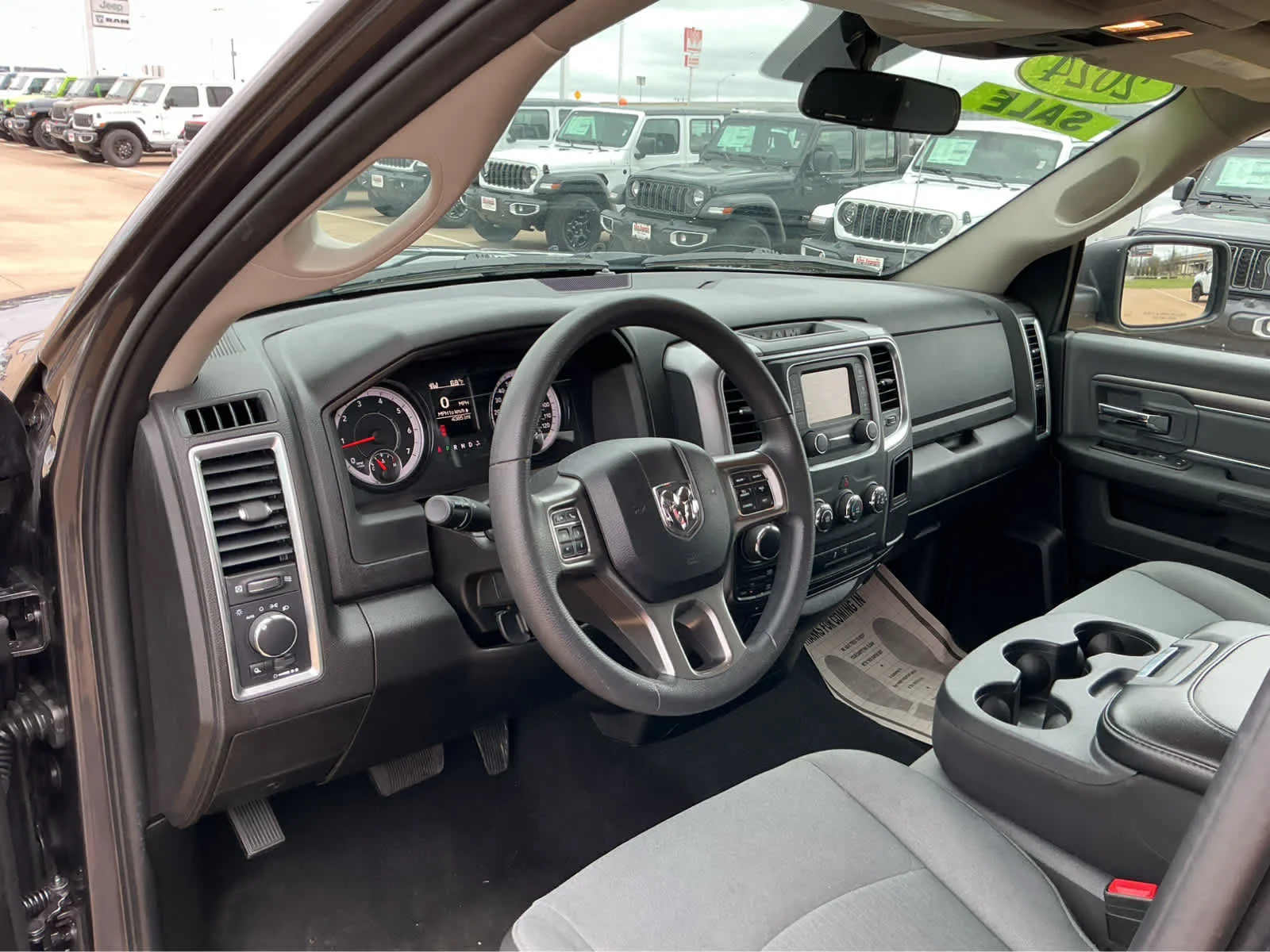 Used 2024 Granite Crystal Metallic Clearcoat Ram SLT image 17