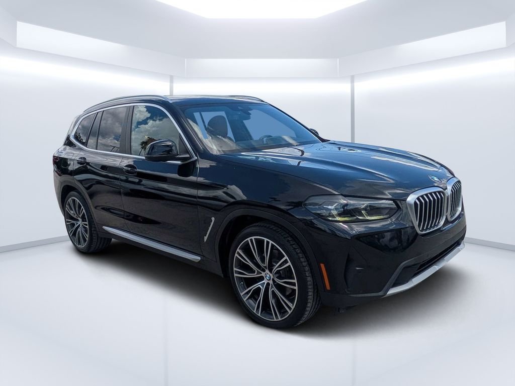 Used 2022 Black BMW sDrive30i image 1