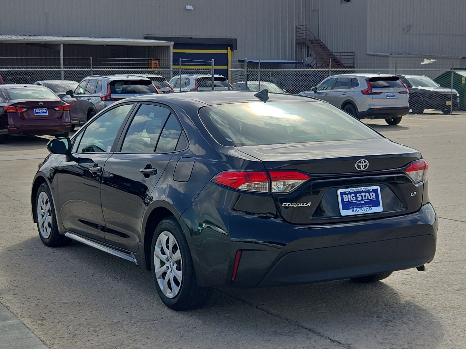 Used 2025 Midnight Black Metallic Toyota LE image 5