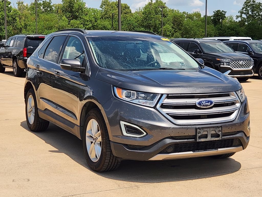 Used 2017 Magnetic Metallic Ford SEL image 3