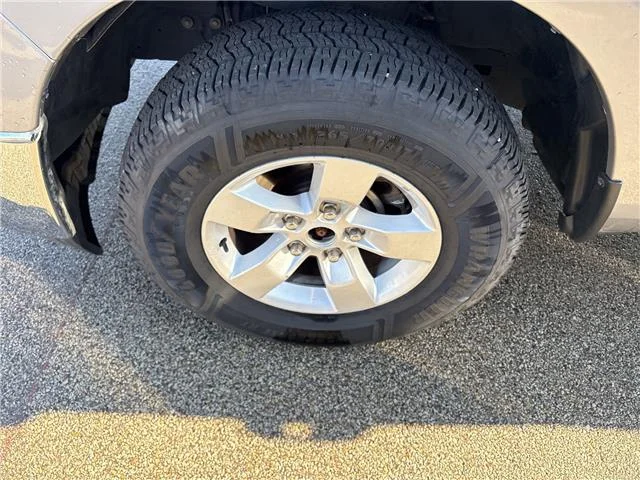 Used 2024 Granite Crystal Metallic Clearcoat RAM SLT 4x4 Quad Cab 6.3 ft. box 140 in. WB image 15