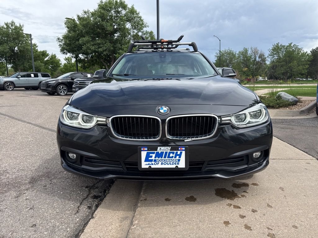 Used 2018 Black Sapphire Metallic BMW 320i xDrive image 8
