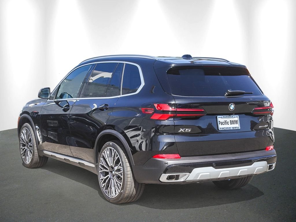 New 2026 Black Sapphire Metallic BMW sDrive40i image 4
