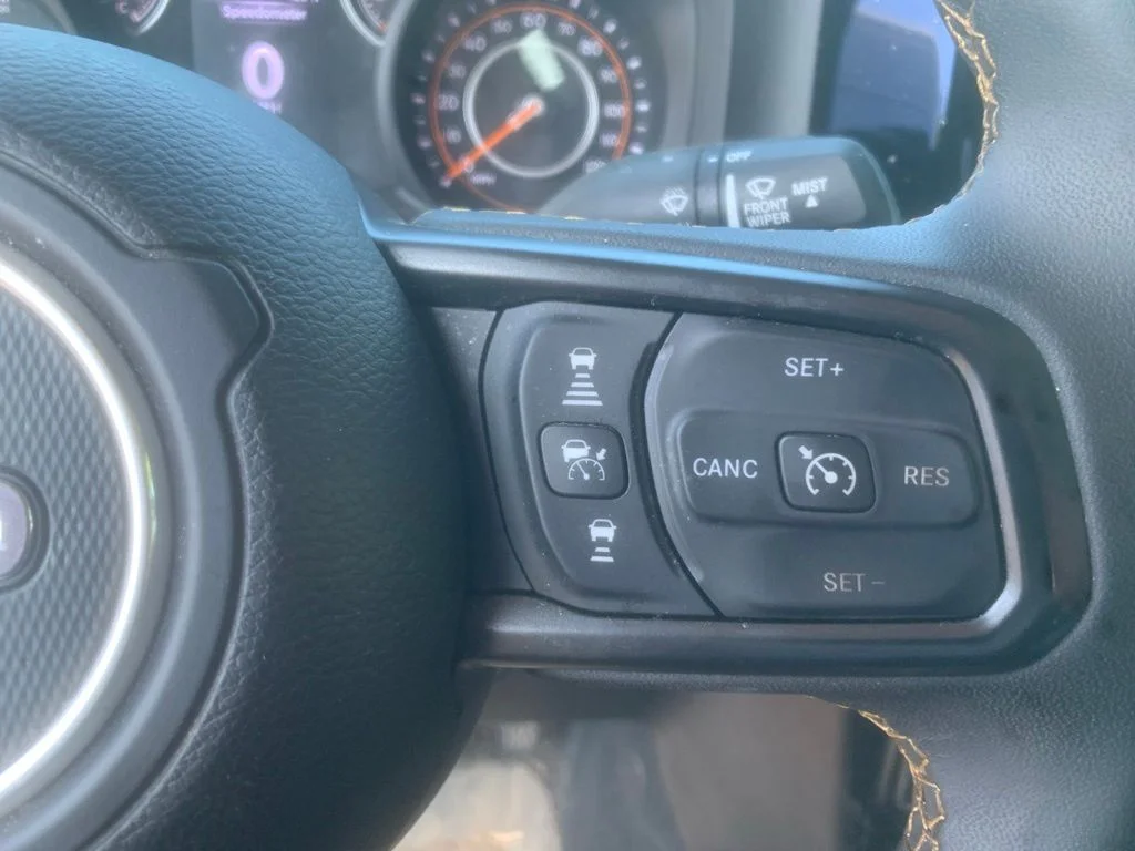 Used 2024 Granite Crystal Metallic Clearcoat Jeep Sport S image 12