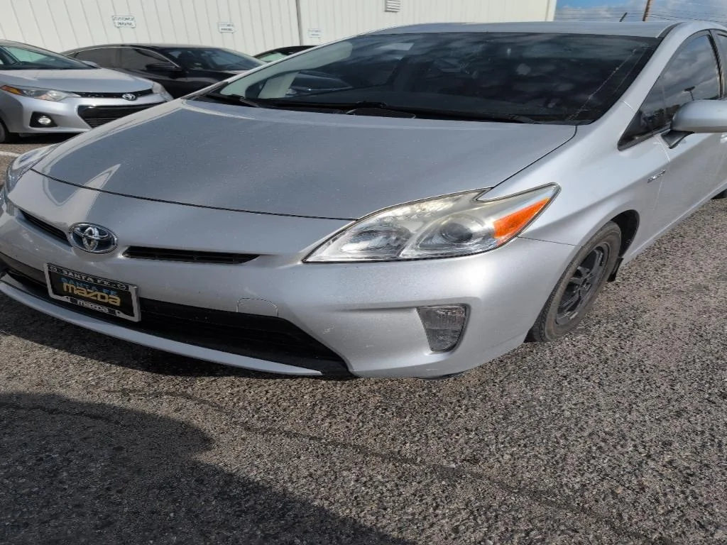 Used 2014 Classic Silver Metallic Toyota Four image 1