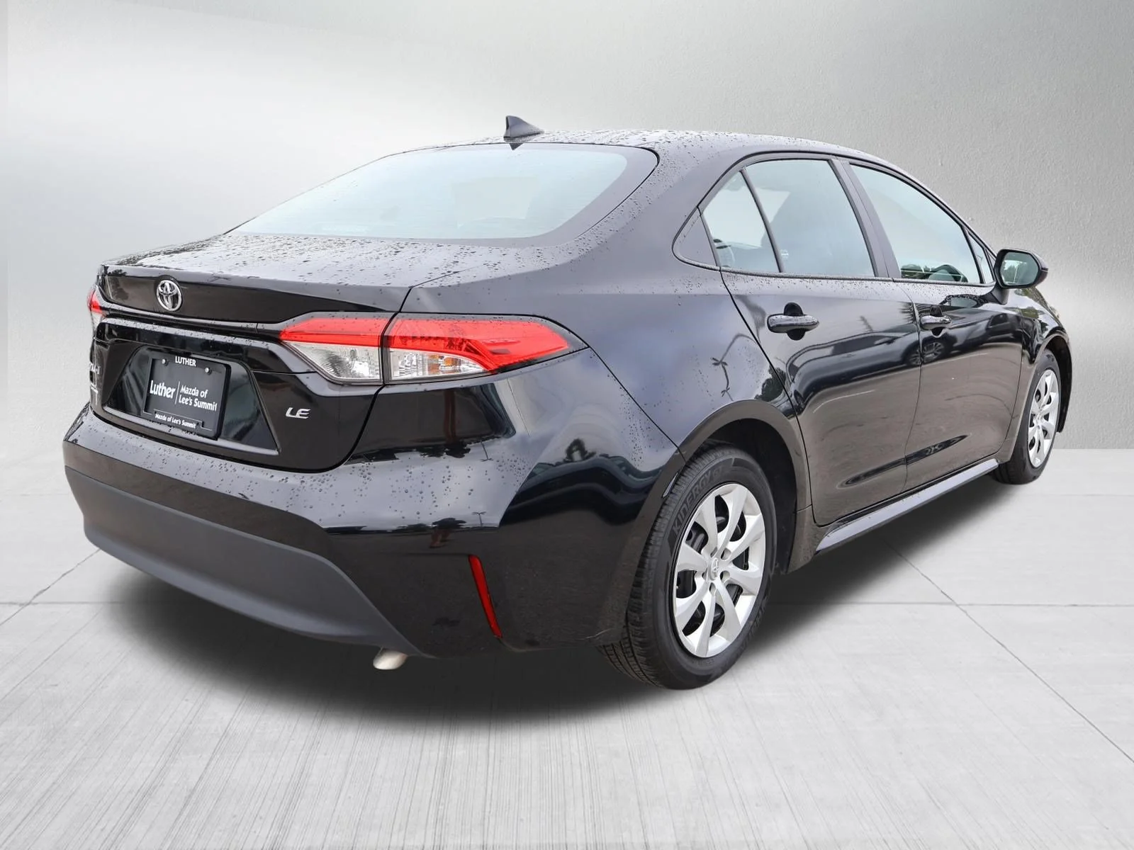 Used 2025 Midnight Black Metallic Toyota LE image 7
