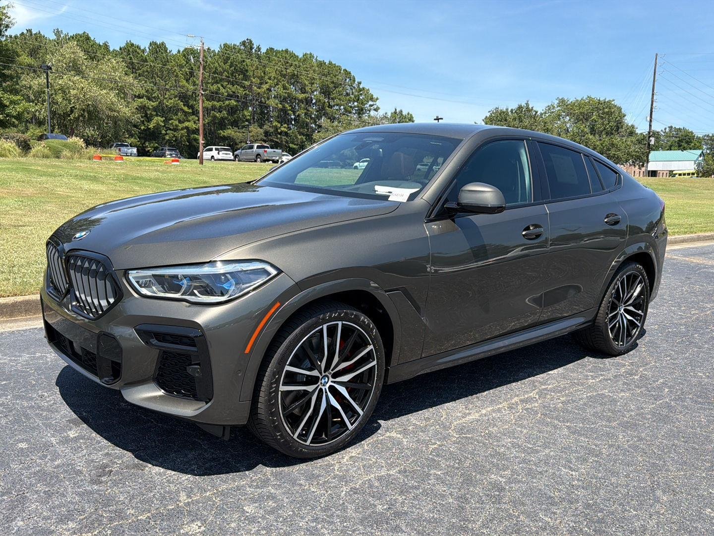 Used 2023 Manhattan Green Metallic BMW M50i image 1