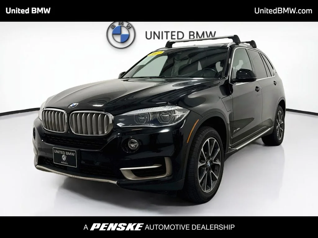 Used 2017 Jet Black BMW xDrive40e image 1