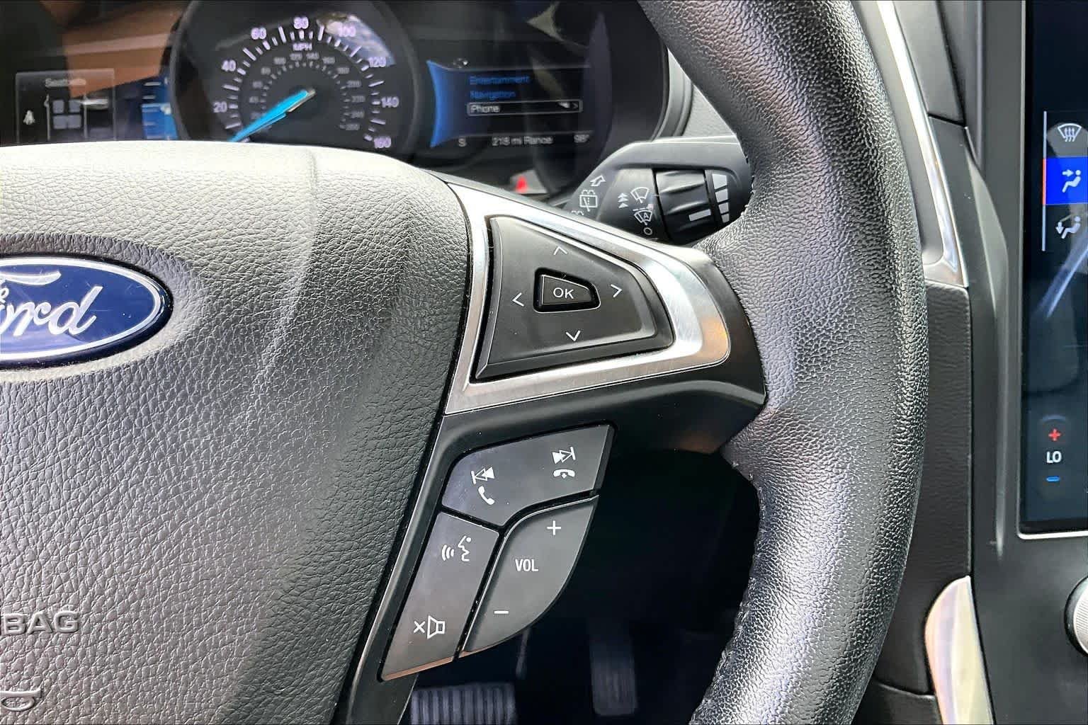 Used 2022 Agate Black Metallic Ford Titanium image 25