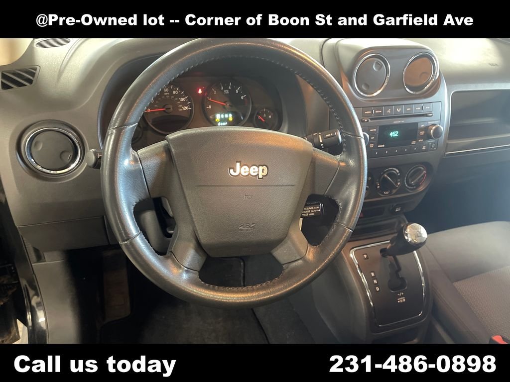 Used 2009 Black Jeep Sport image 17