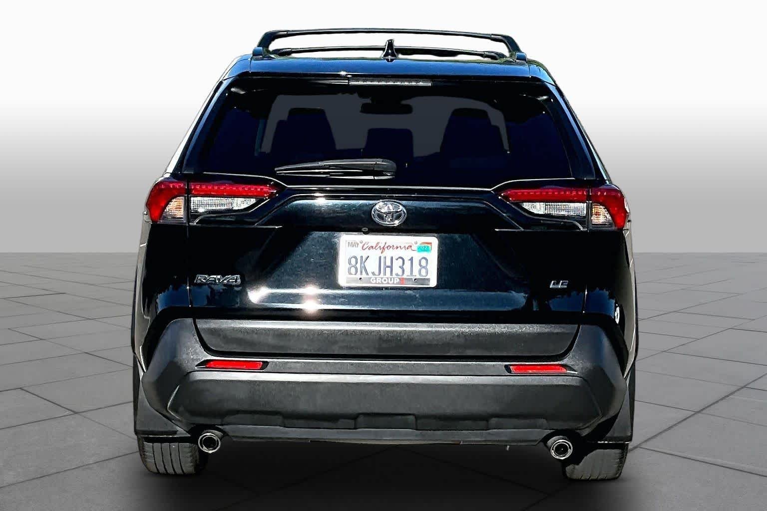 Used 2019 Midnight Black Metallic Toyota LE image 4