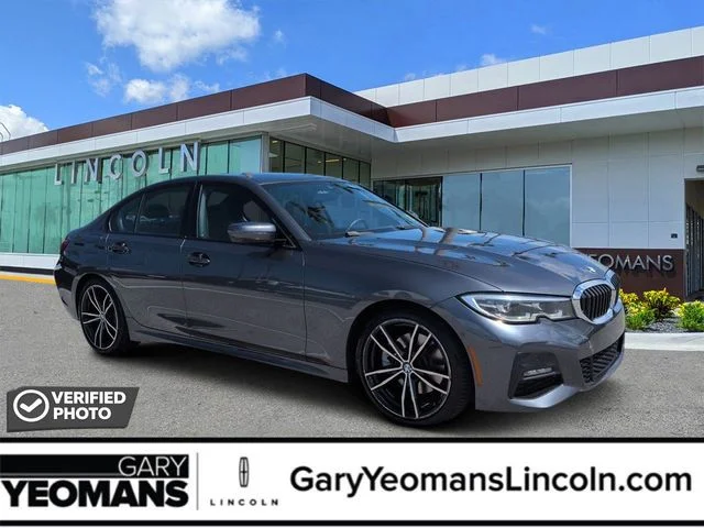 Used 2021 Mineral Gray Metallic BMW 330i image 1