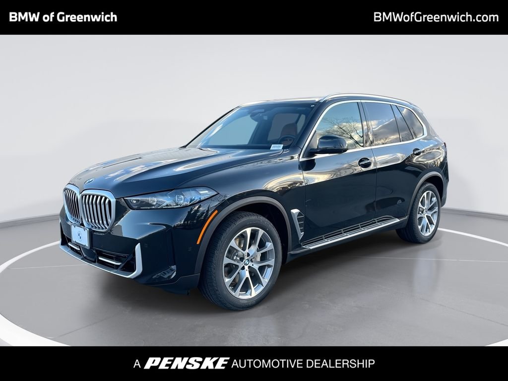 Used 2026 Black Sapphire Metallic BMW xDrive40i image 1