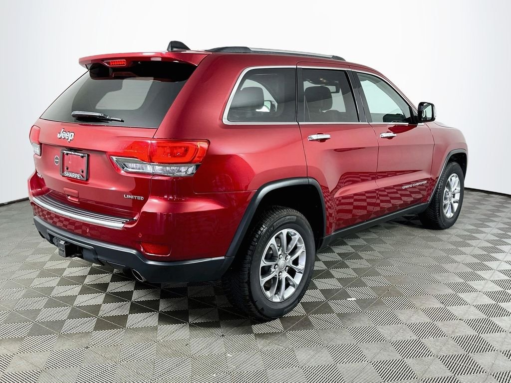 Used 2015 Deep Cherry Red Crystal Jeep Limited image 5