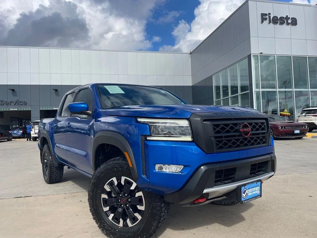 Certified Used 2024 Blue Nissan PRO-4X image 1