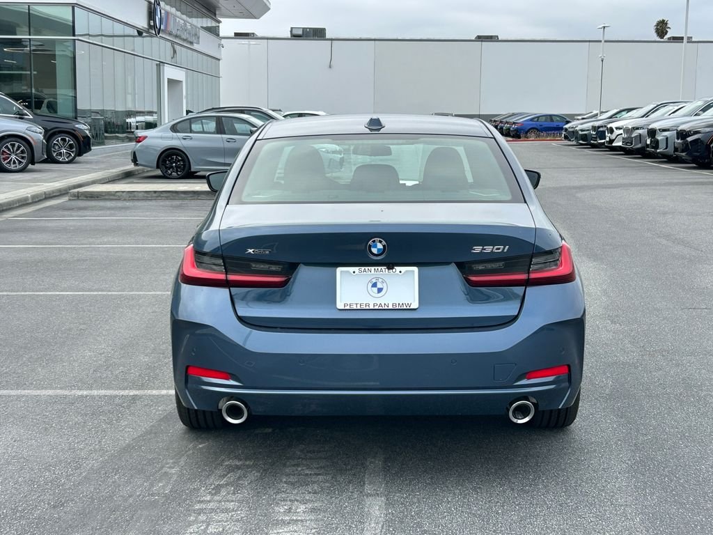 New 2026 Arctic Race Blue metallic BMW 330i xDrive image 4