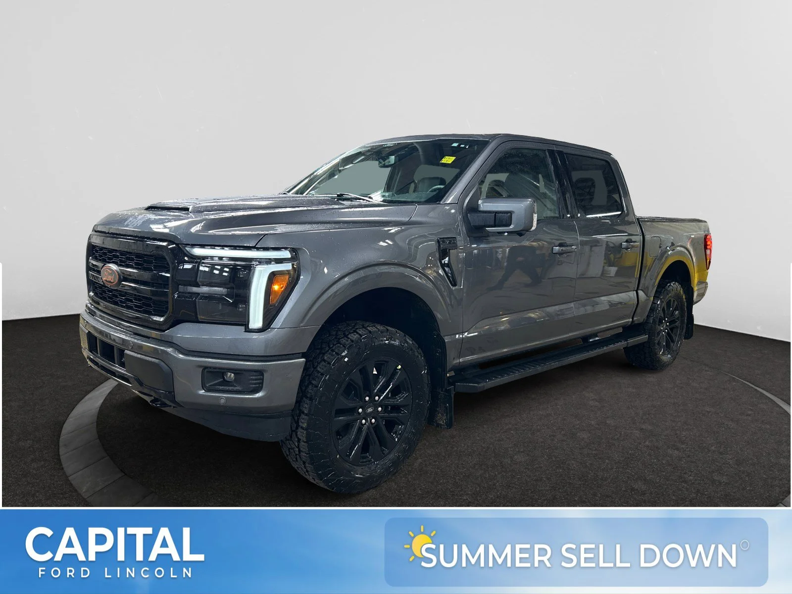 New 2026 Carbonized Grey Metallic Ford Lariat image 1