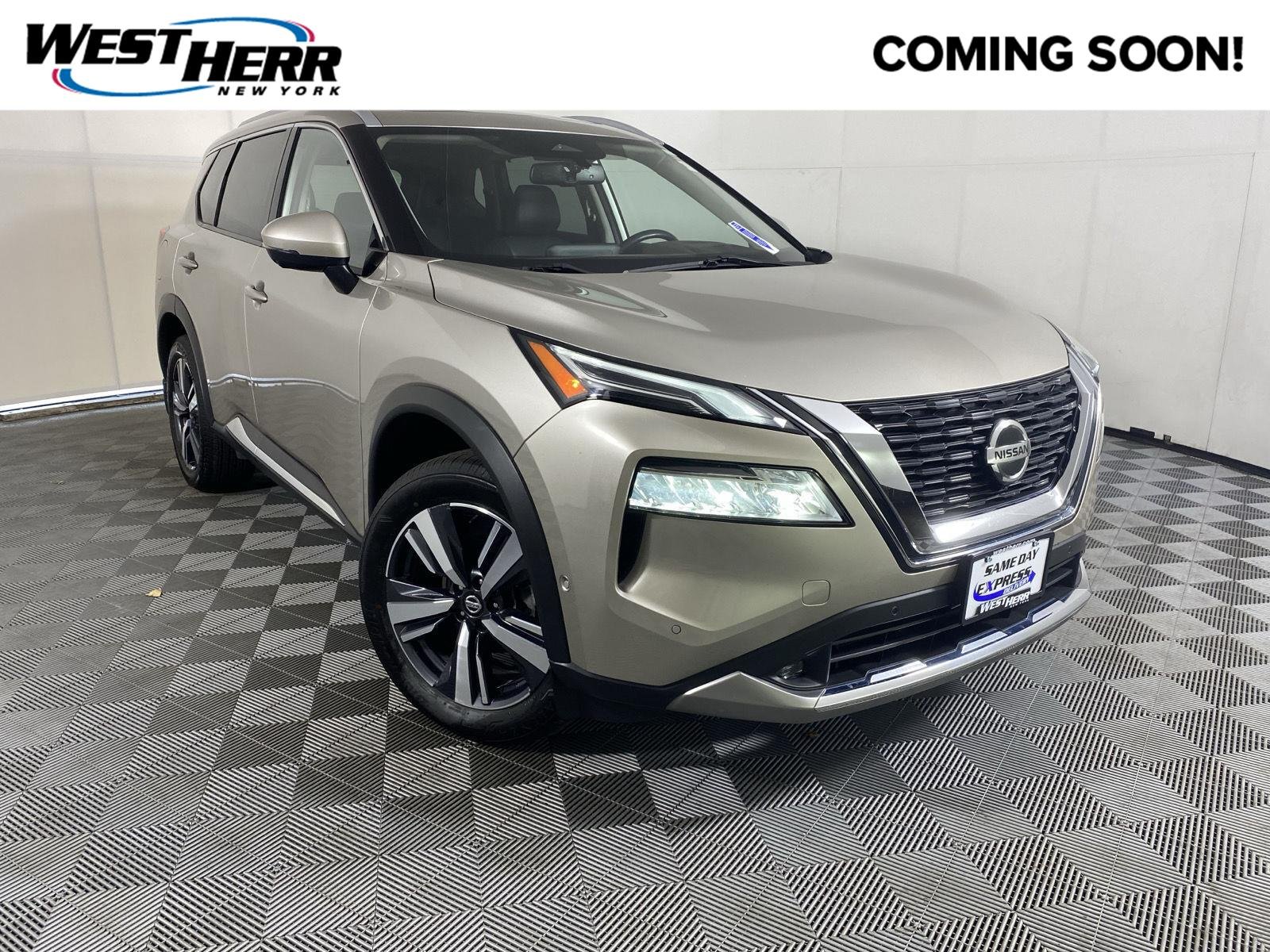 Used 2021 Champagne Silver Metallic Nissan Platinum image 1