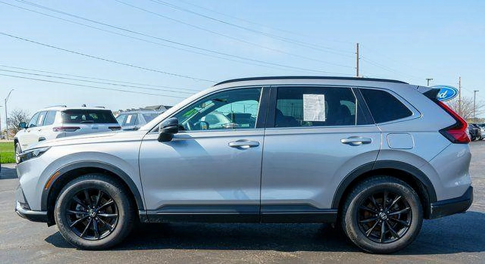 Used 2024 Lunar Silver Metallic Honda Sport-L image 9