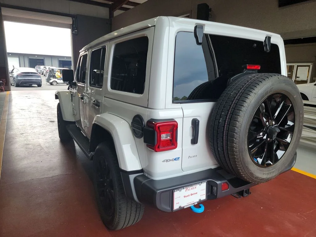 Used 2023 White Jeep Sahara 4xe image 4