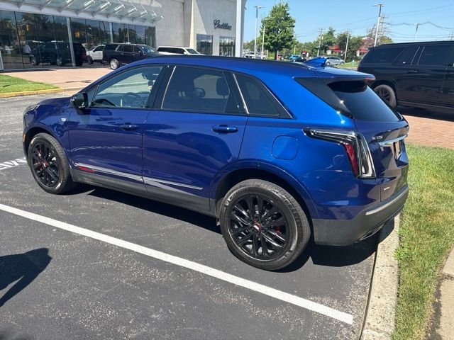 Used 2025 Blue Cadillac Sport image 2