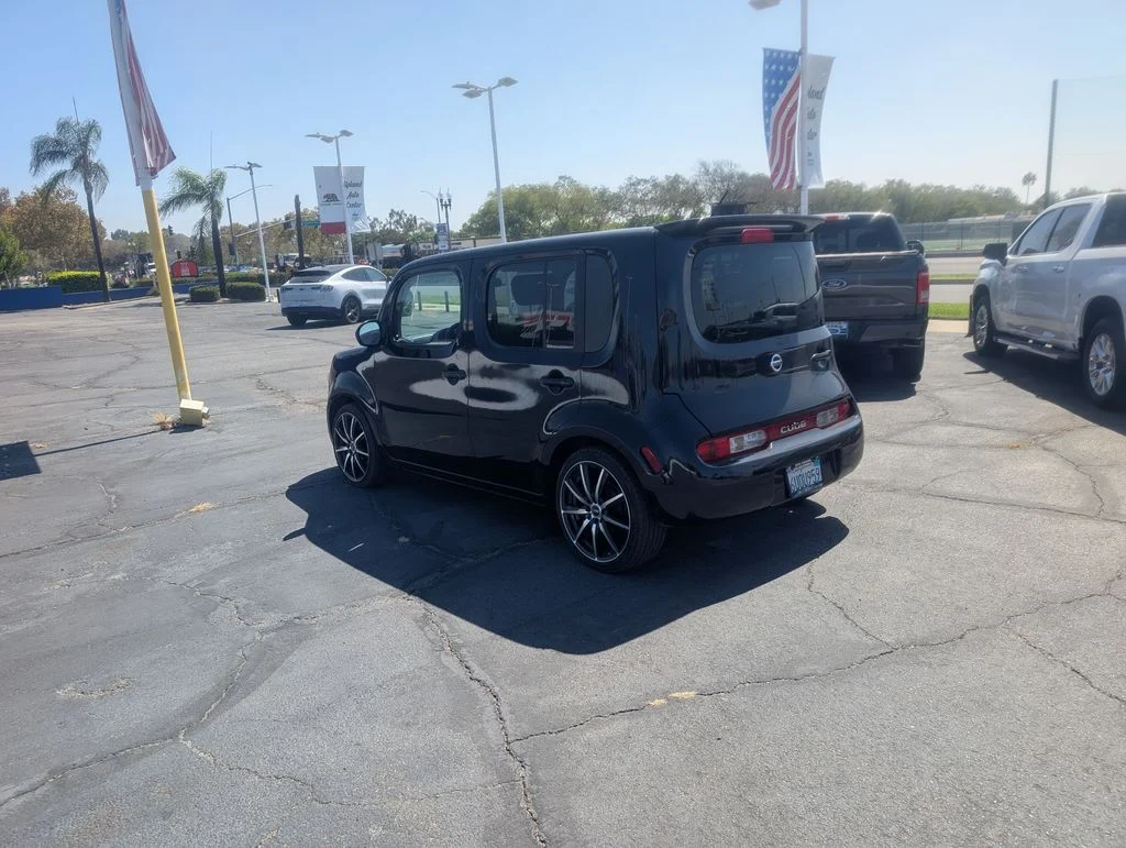 Used 2011 Sapphire Black Pearl Nissan 1.8 S image 4